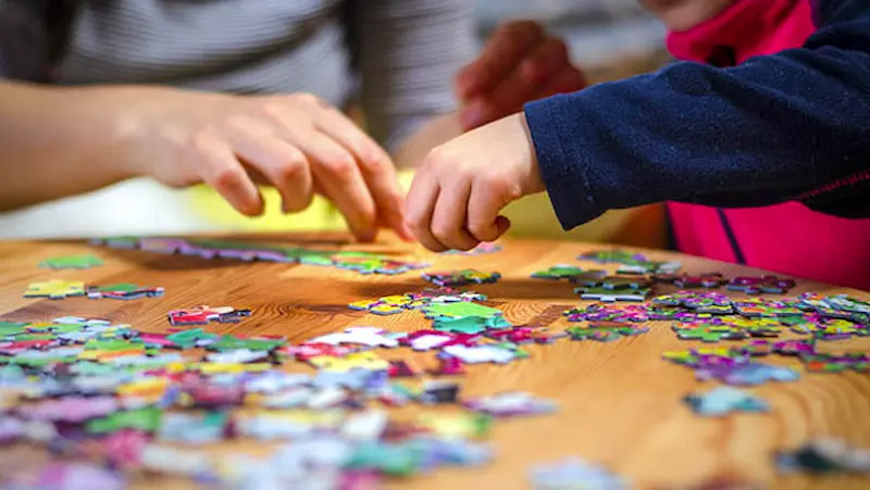 Solving puzzles in summer cap activities