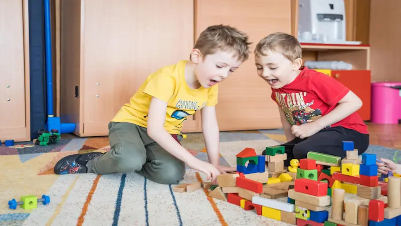 Blue foam building blocks allow kids to create structures and